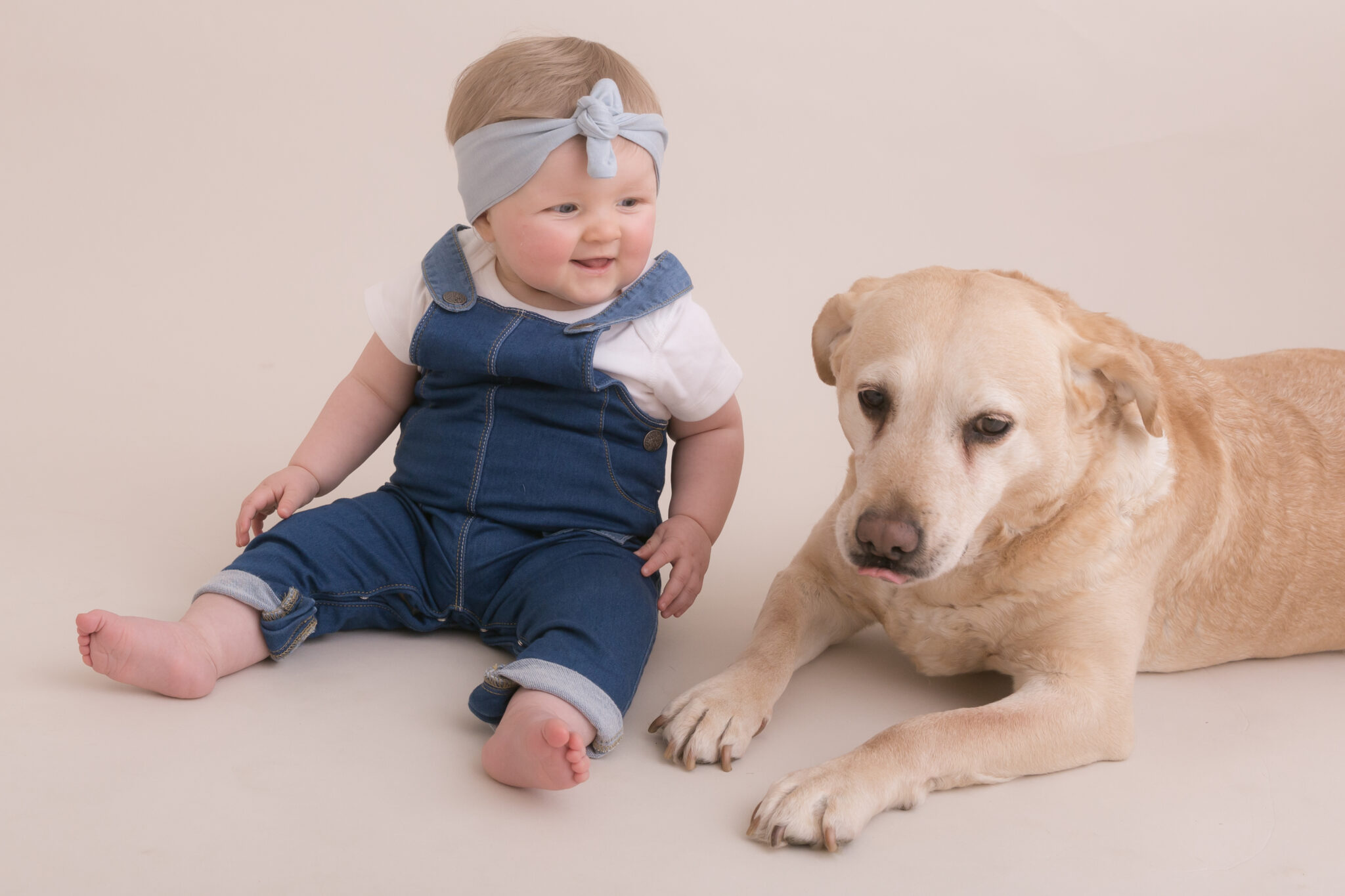 photo of dog and baby
